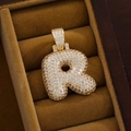 Macro shot of gold-plated iced out letter R pendant with cubic zirconia in velvet box - Pendant Only (Without Chain) / Letter R