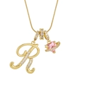 Golden necklace featuring a sparkling letter R and pink heart planet charm pendant - Letter R Heart Planet Necklace (With Stainless Steel Snake Chain) / Gold