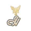 Macro detail of golden butterfly pendant with blue and white zircon pavé letter J - Letter G Style