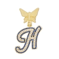 Close-up of golden butterfly letter H pendant with multi-colored zircon stones - Letter H Style