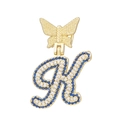 Detailed view of gold letter K butterfly pendant with blue and white pavé crystals - Letter K Style