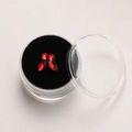 Marquise cut red crystal tooth gems set in a circular storage case with black velvet liner - Large / Red