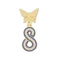 Detail of gold butterfly pendant with blue and white zircon micro-pave infinity symbol - Letter S Style