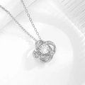 Elegante Kleeblatt-Halskette mit funkelndem runden Zirkonia-Stein und Liebesknoten-Design - Anhänger Mit 18K Vergoldeter O-Kette / Silber