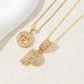 Gold letter P necklace set with sparkling baguette zircon crystals and box chain - Letter P