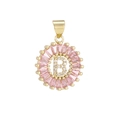 Macro detail of golden letter B pendant with pink baguette zircons and white crystals - Gold B