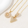 Gold plated initial V necklaces set with pavé cubic zirconia for a luxury fashion look - Letter V