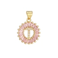 Macro view of gold-plated letter T pendant with pink baguette stones and white zircons - Gold T