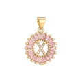 Detail of gold circular pendant with a zircon-encrusted letter X and pink baguette stones - Gold X