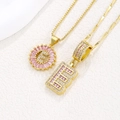 Pink baguette crystal letter E necklace in gold finish with micro-paved zircons - Gold E