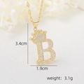 Macro detail of crown letter B pendant with cubic zirconia and 18k gold plating - Gold Letter B Crown Pendant / Gold