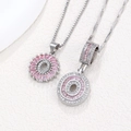 Silver-tone necklace set with pink crystal pendant and sparkling zircon accents - Silver O