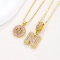 Pink gemstone letter N necklace set in gold plating with cubic zirconia details - Gold N