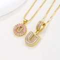 Pink zircon letter U pendant necklace with gold plating and sparkling crystal stones - Gold U