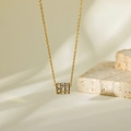 Elegant gold titanium necklace with a triple-row diamond-set cylindrical pendant charm - Gold Rhinestone Cylinder Style (HC77)