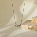 Minimalist silver-tone titanium steel necklace with a gradient five-bead pendant design - Silver Gradient Five-Bead Style (HC328)
