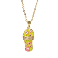Close-up of golden flip-flop pendant with green enamel, pink evil eyes and rhinestones - Lime Green (Pattern D)