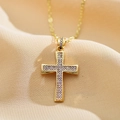 Detailed view of gold cross necklace with micro-set purple cubic zirconia on silk - Purple
