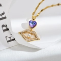 Vergulde ketting met paars hartkristal, zirkoon lippen hanger en parel accent - Paars