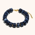 Blue marble resin cylinder beaded bracelet with 18K gold plated stainless steel accents - Bracelet / Blue