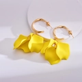 Detail of yellow acrylic rose petal earrings with elegant golden twisted hoop accents - Yellow