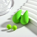 Detailed view of neon green chubby teardrop and ball stud earring set in matte finish - Green
