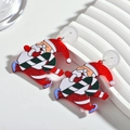 Funkelnde Acryl-Ohrringe mit laufendem Weihnachtsmann-Motiv und rotem sowie grünem Glitzer - Laufender Weihnachtsmann