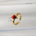 Macro detail of gold adjustable star ring with marbled red stone and 2g weight mark - Star Shape Design (HC041)