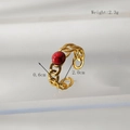 Detailed view of adjustable gold chain ring with red gemstone and product measurements - Hollow Chain Design (HC043)