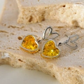 Eleganti orecchini a cuore con zircone giallo e finitura in acciaio inossidabile - Pendaglio a Cuore (B0137) / Giallo Argentato