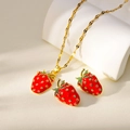 Mini red strawberry jewelry set with gold necklace and stud earrings in enamel finish - Green Leaf Strawberry Jewelry Set