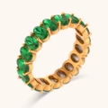 Macro view of gold plated stainless steel ring set with oval cut green emerald cubic zirconia - Oval Zircon Eternity Ring - Green - Size 6