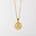 Minimalist gold titanium necklace with a white pearl shell circle pendant featuring letter A - English Letter A (X029-A)