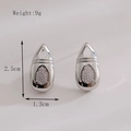 Boucles d'oreilles goutte d'eau de 2,5 cm, argentées, avec zircons et plaqué or 18 carats - Argent