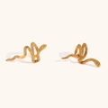 Detailed close-up of 18K gold plated snake ear cuffs showing fine scale textures - Gold