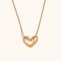 Detail of 18K gold-plated snake chain featuring an irregular hollow heart pendant - Gold Thin Snake Chain Heart Necklace
