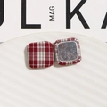 Detailed macro of red checkered fabric square button showing metallic magnetic backing - Rounded Square Style / Red