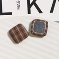 Macro shot of square brown checkered fabric buttons and metal base for DIY accessories - Rounded Square Style / Brown