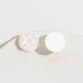 Ivory white round resin shoe buckles with geometric water ripple and smooth finish - Hammered Faceted Style / White