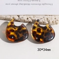 Detail shot of leopard print resin C-shaped earrings on white stone prop 30x34mm - 4# Irregular C-Shape / 30x34mm