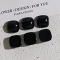 Close-up of six glossy black resin square accessories for DIY jewelry and hair clips - Square Black