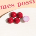 Nahaufnahme der 12mm roten Acryl-Cabochons mit flacher Basis für DIY-Schmuckherstellung - 1 Stück / Rot