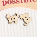 Detailed view of two cat-shaped wooden buttons with laser-engraved textures for DIY crafts - White Cat