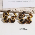 Detailed view of 32x32mm leopard print flower wave earrings in amber resin finish - 32x32mm