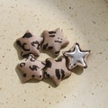 Close-up of leopard print star-shaped buttons and satin fabric fashion accessories - Light Color Star (E01-5-7-10)