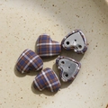 Detailed view of heart-shaped plaid fabric buttons on a ceramic tray for DIY sewing crafts - Blue Heart Plaid (Single) / Blue