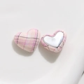 Macro detail of heart-shaped pink plaid fabric buttons with silver metal back base - Pink Small Heart