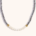 Dettaglio della collana in acciaio inossidabile placcato oro 18K con dieci perle d'acqua dolce - Argento