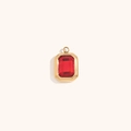 Macro view of vintage rectangular gold pendant with a faceted red stone and secure loop - Gold - Bright Red Zircon