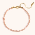 Detail of 18K gold plated clasp and natural orange stone beads on an elegant anklet - Sunstone